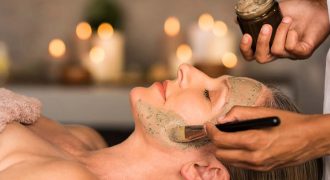 woman getting a facial | facials + massages
